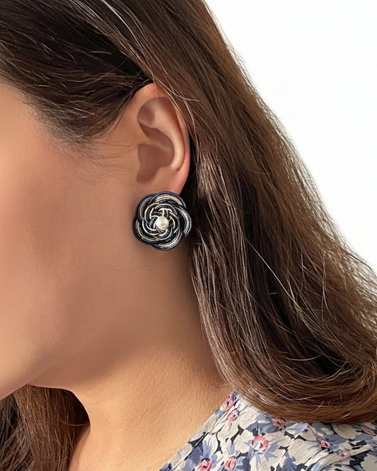 Model wearing handmade Japanese mizuhiki asymmetrical pearl earrings with navy knotted detailing