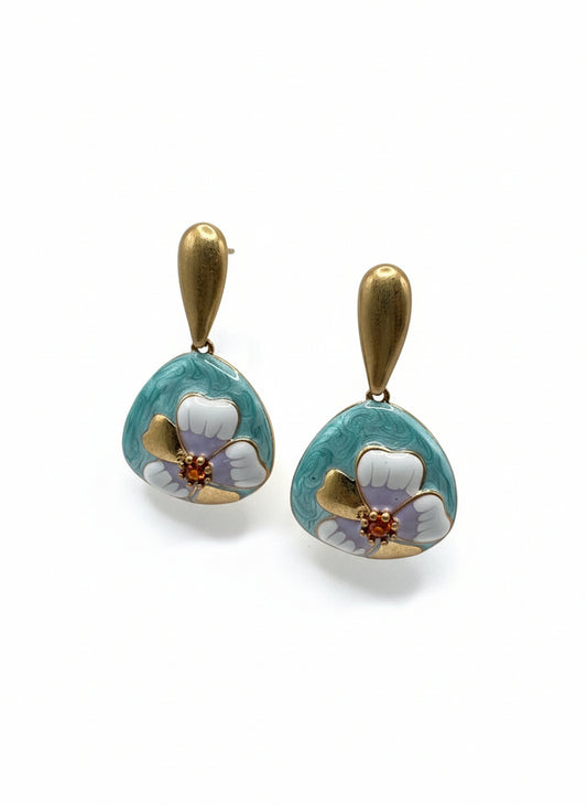 Vintage court turquoise enamel flower drop earrings with gold finish on white background